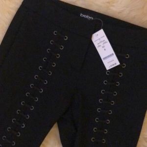 Nwt- Bebe pants with lace-up detail